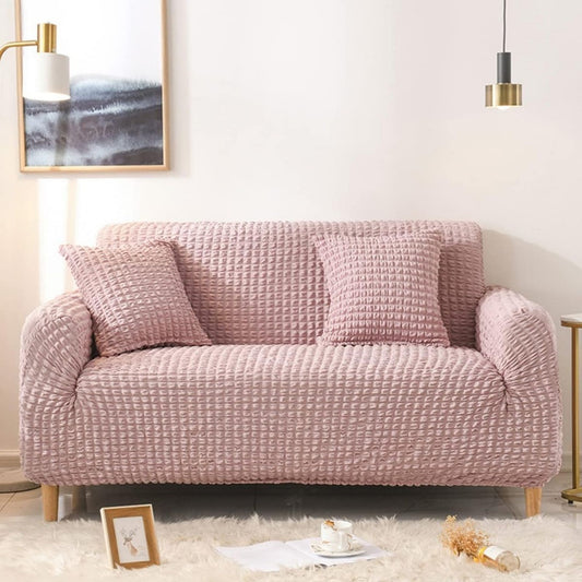 Seduta imbottita rosa con braccioli